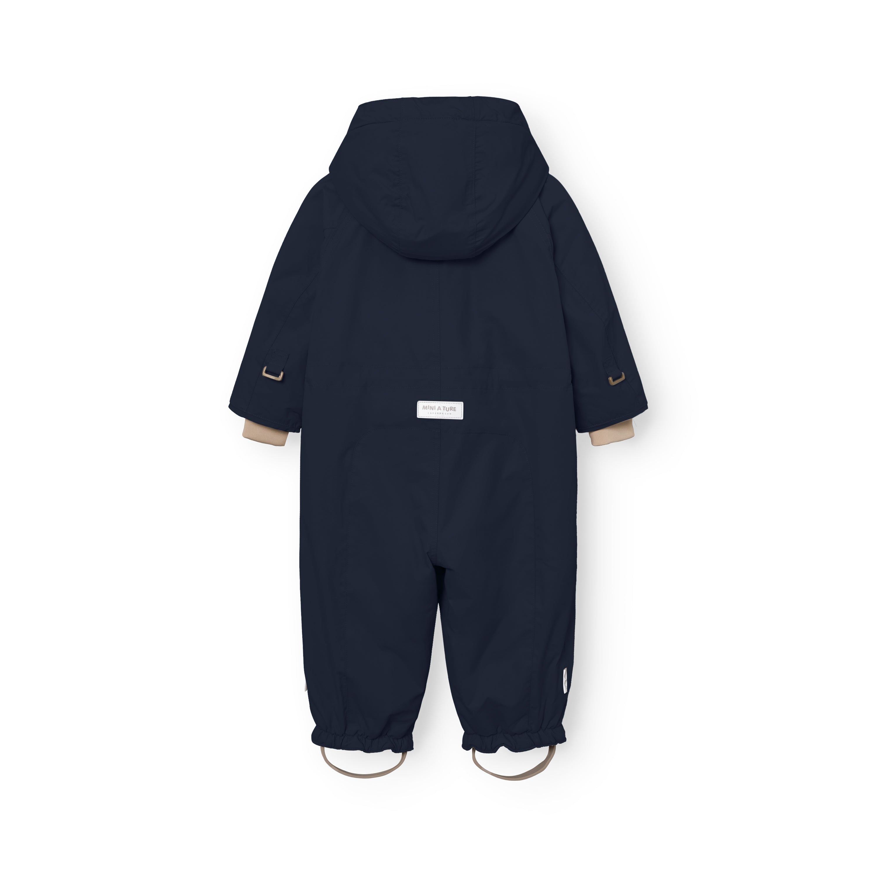 MATWISTI fleece lined snowsuit in navy blue laid flat showing the rear view with detachable hood, white MINI A TURE label at the lower back, beige ribbed cuffs and elasticated leg openings with adjustable foot straps featuring metal D-rings.