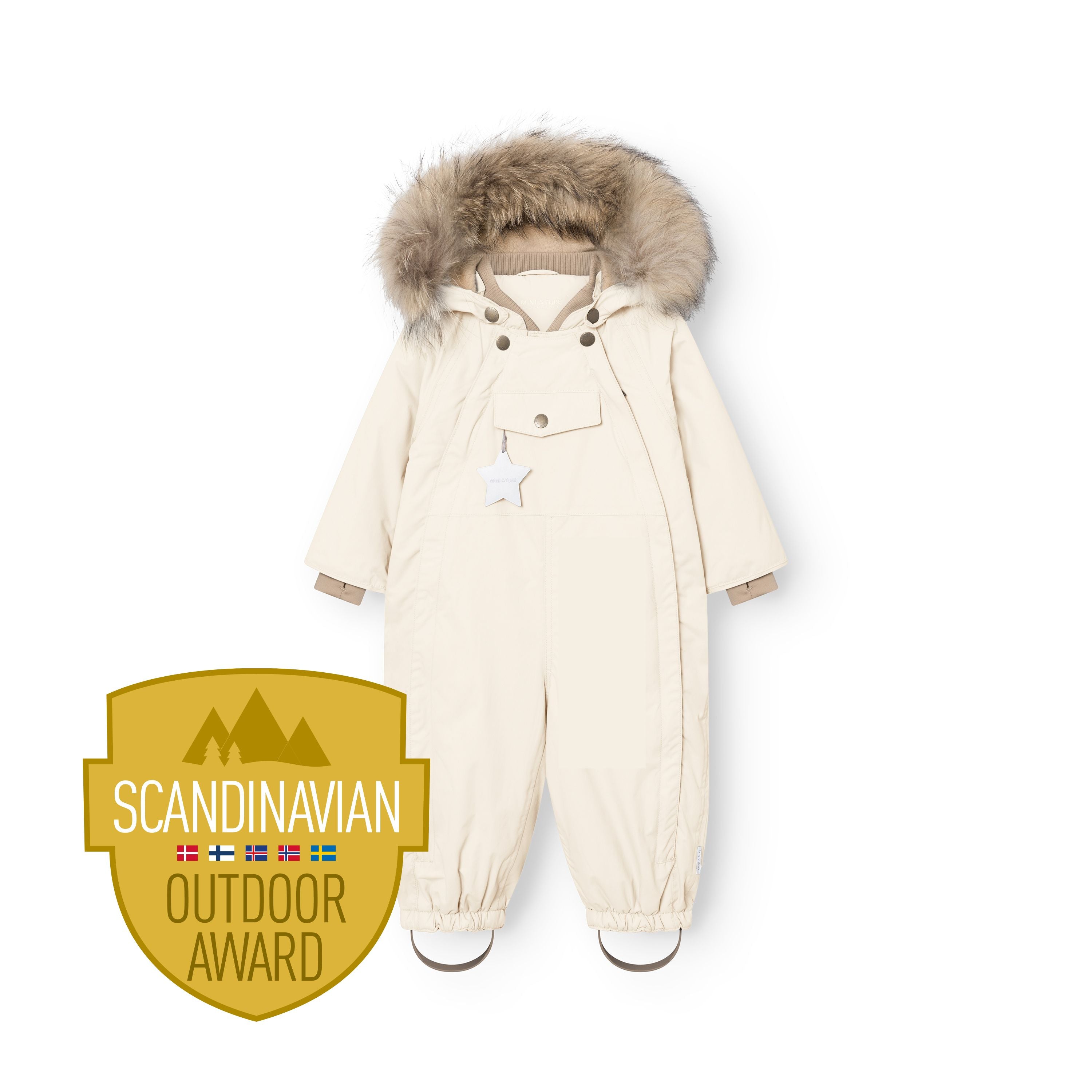MATWISTI fleece lined snowsuit fur in cream with genuine fur-trimmed detachable hood, taupe ribbed collar, press-stud chest fastenings, front pocket with white reflective star, elasticated ankle cuffs with adjustable foot straps, and Scandinavian Outdoor Award badge.