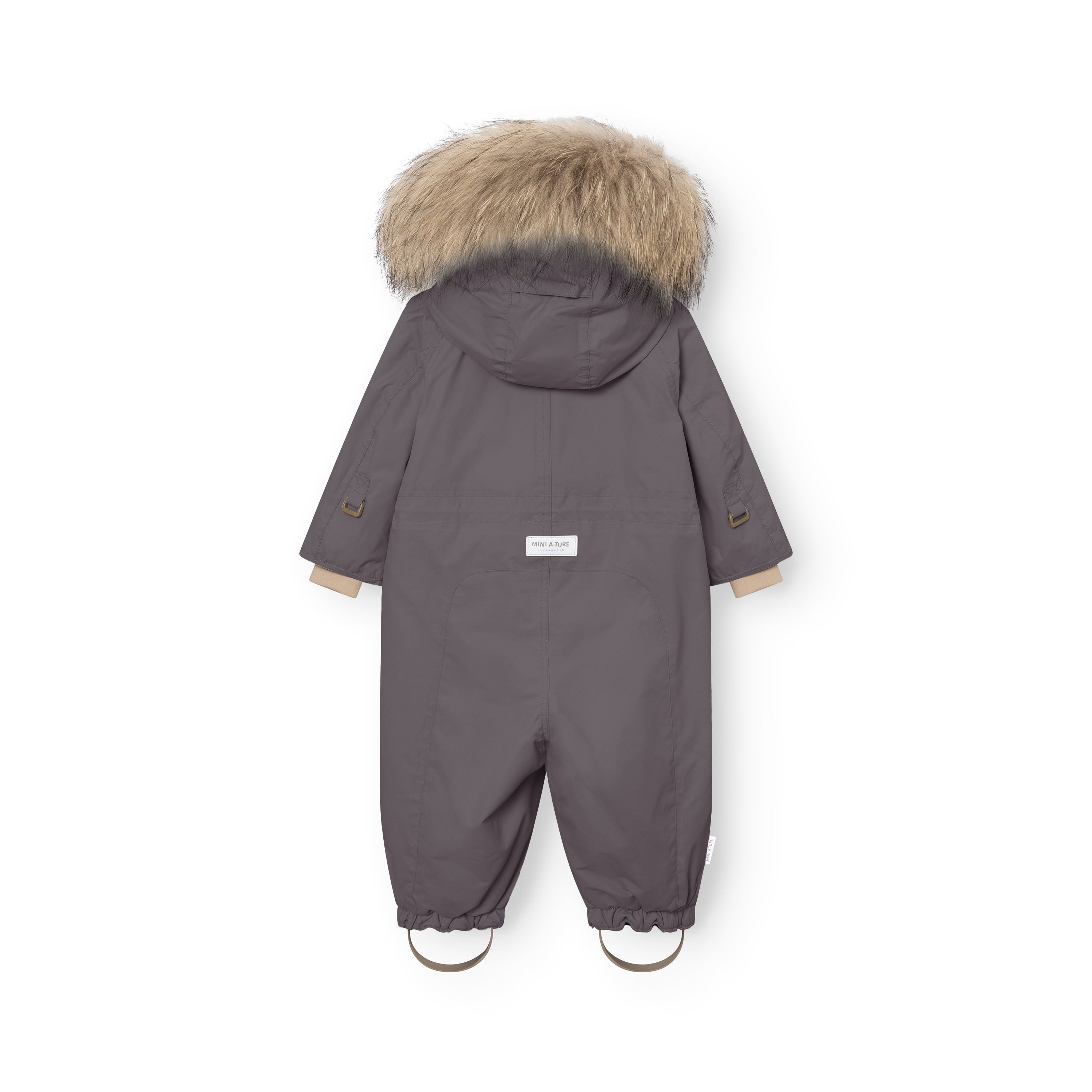 Rear view of MATWISTI fleece lined snowsuit fur in grey showing the genuine fur-trimmed hood, MINI A TURE label at the lower back, beige fleece lining visible at the cuffs and hood edge, and elasticated ankle cuffs with adjustable foot straps.