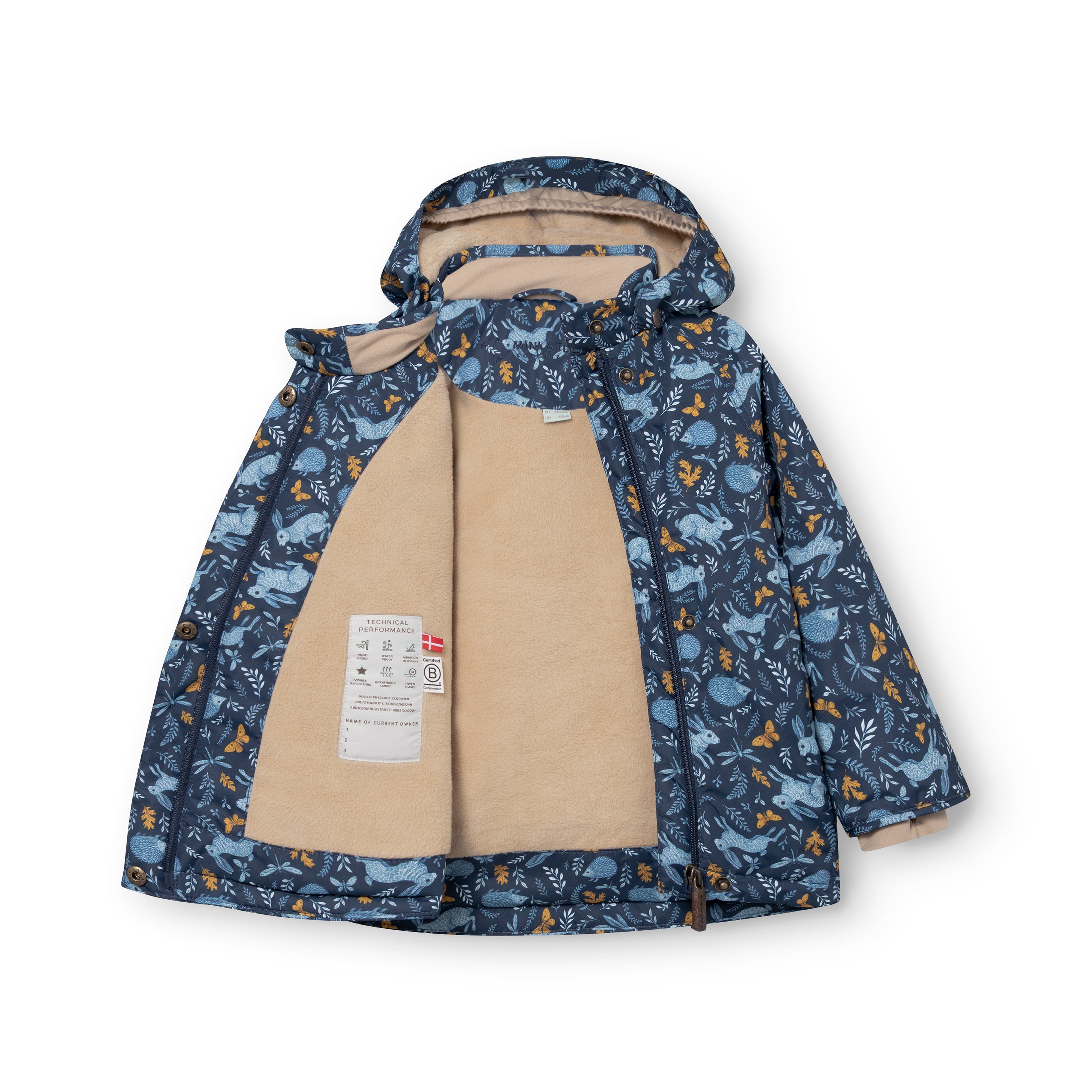 MATWANG fleece lined winter jacket photographed fully open and laid flat to show the complete beige fleece lining from hood to hem, the technical performance label displaying waterproof rating and temperature specifications, and the Scandinavian floral print shell featuring blue rabbits and golden oak leaves across the recycled polyester outer.